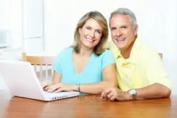 photo_dental_-_21st_century_couple_with_computer